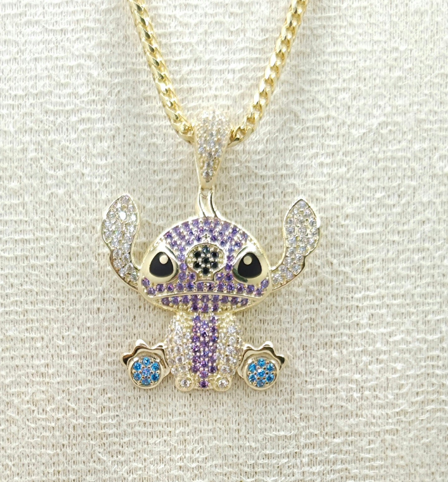 10K PURPLE CZ STITCH PENDANT – JY Jewelry Wholesale