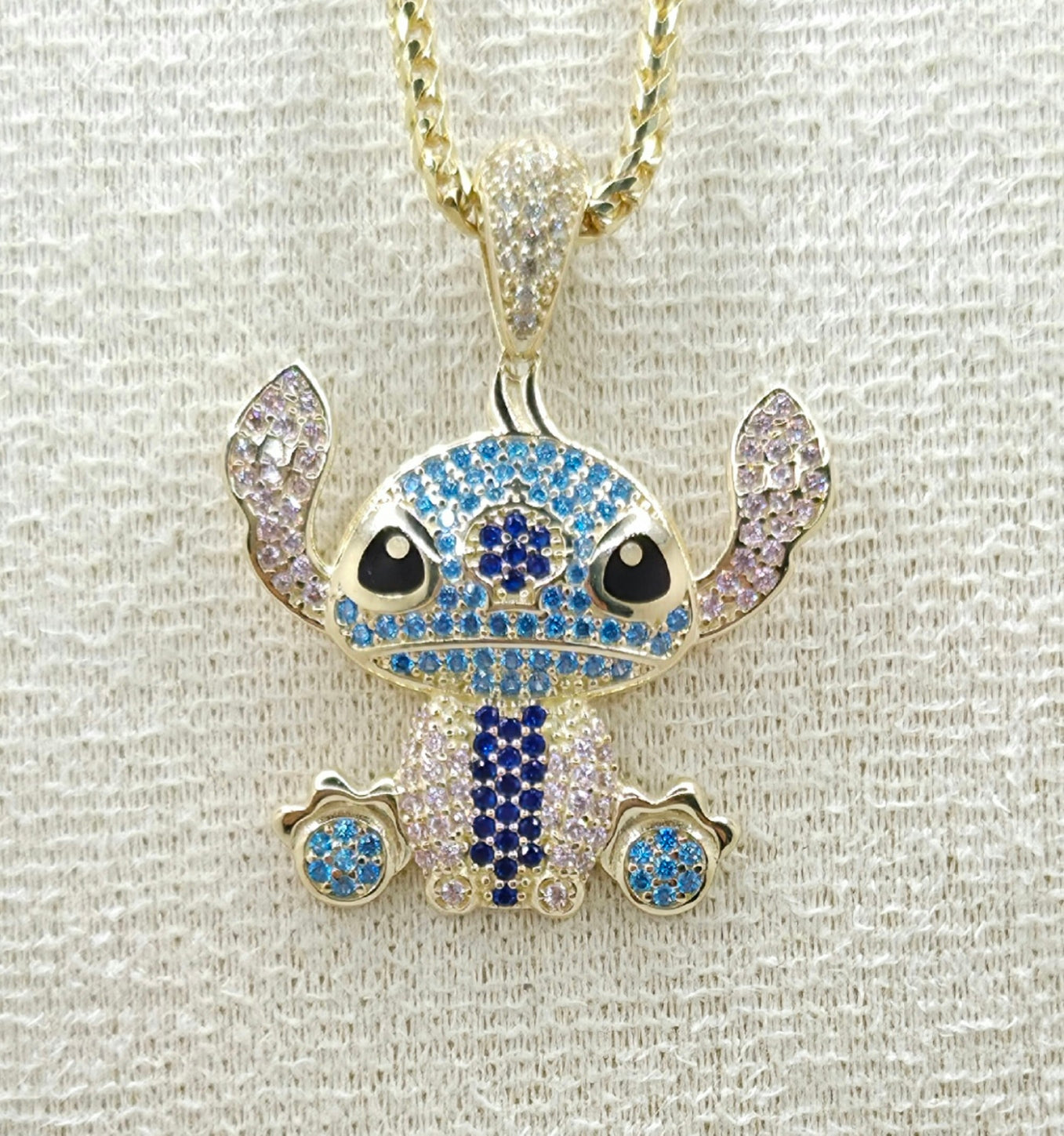 10K BLUE CZ STITCH PENDANT – JY Jewelry Wholesale