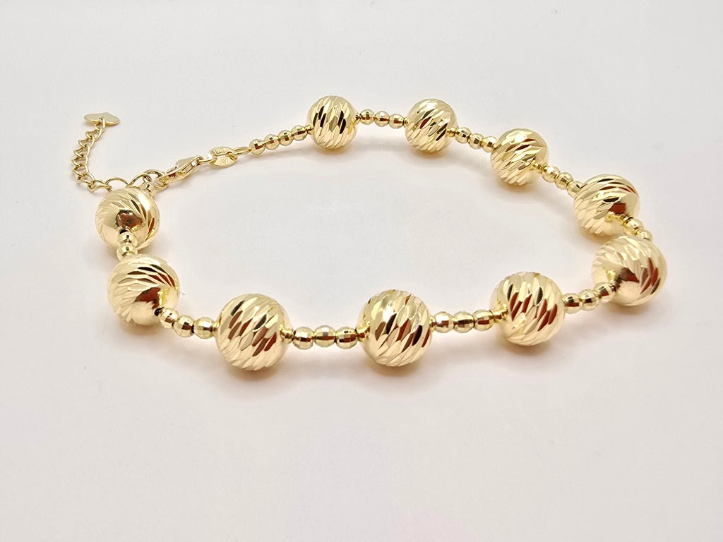 10K YELLOW GOLD LARGE BEAD DIAMOND CUT BRACELET – 7" – JY Jewelry Wholesale