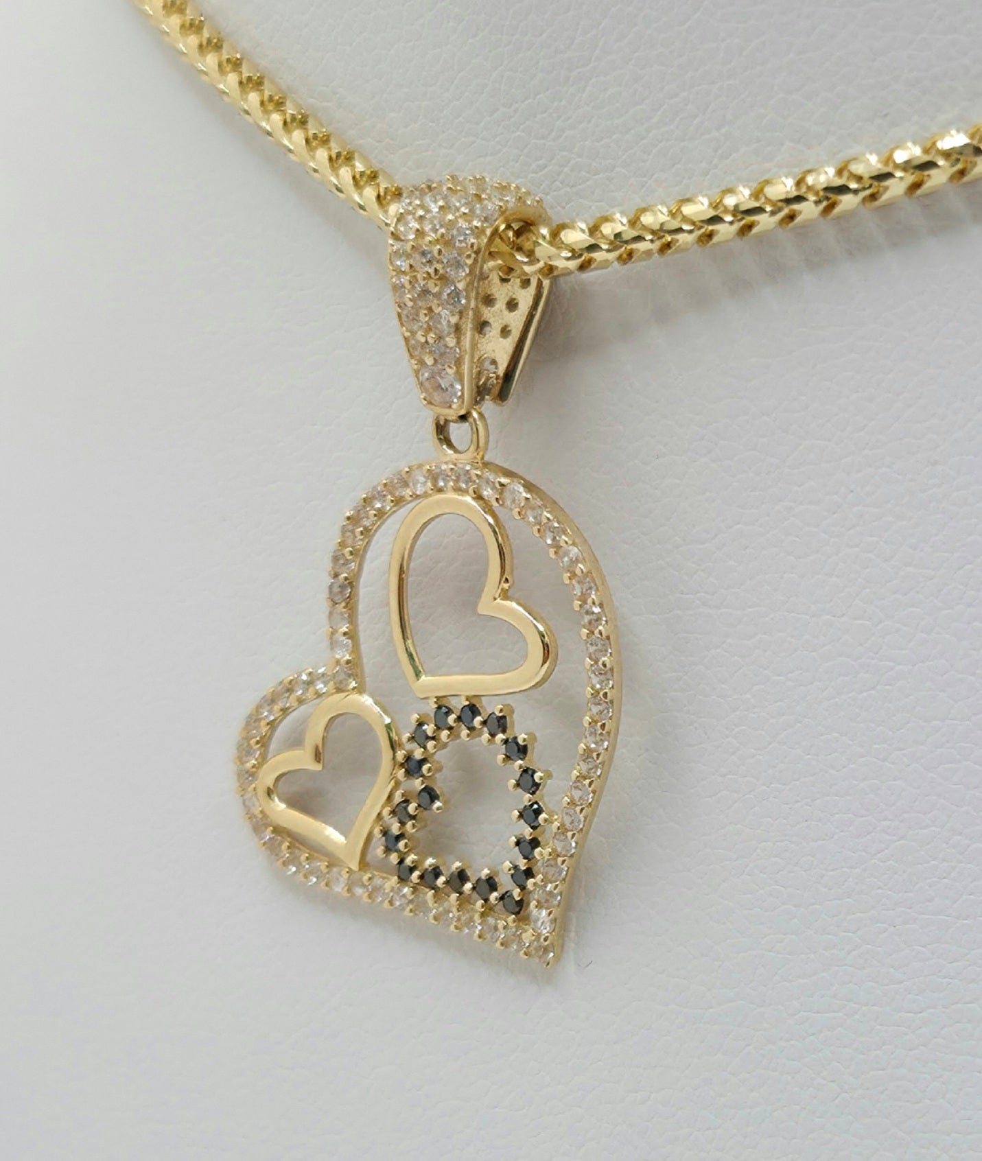 14K CZ SILHOUETTE THREE HEARTS PENDANT – JY Jewelry Wholesale