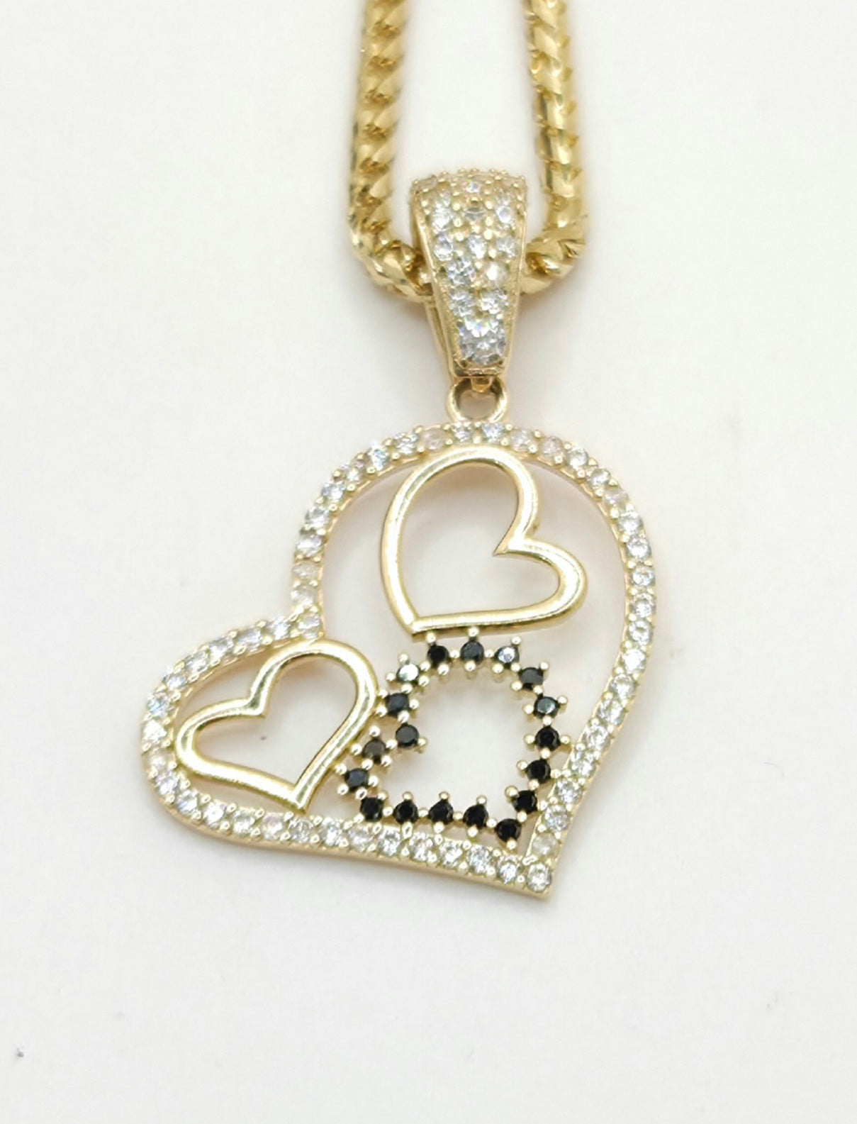 14K CZ SILHOUETTE THREE HEARTS PENDANT – JY Jewelry Wholesale